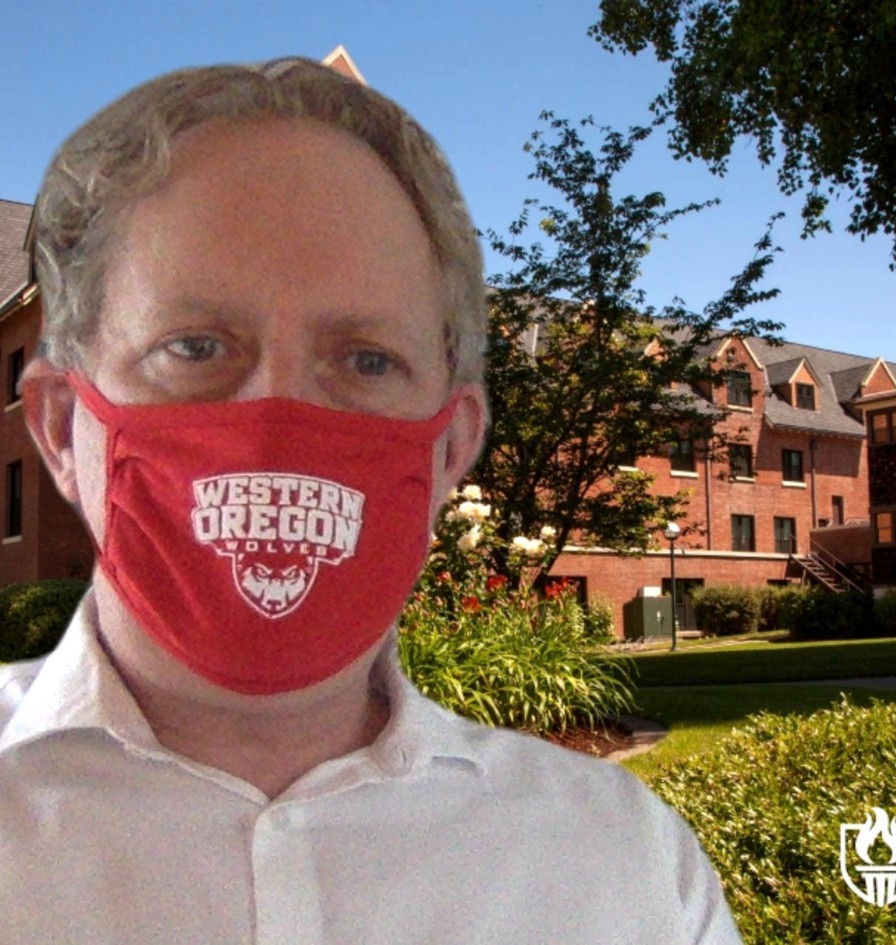 Rob Winningham in front of a virtual background wearing a red WOU non-surgical mask
