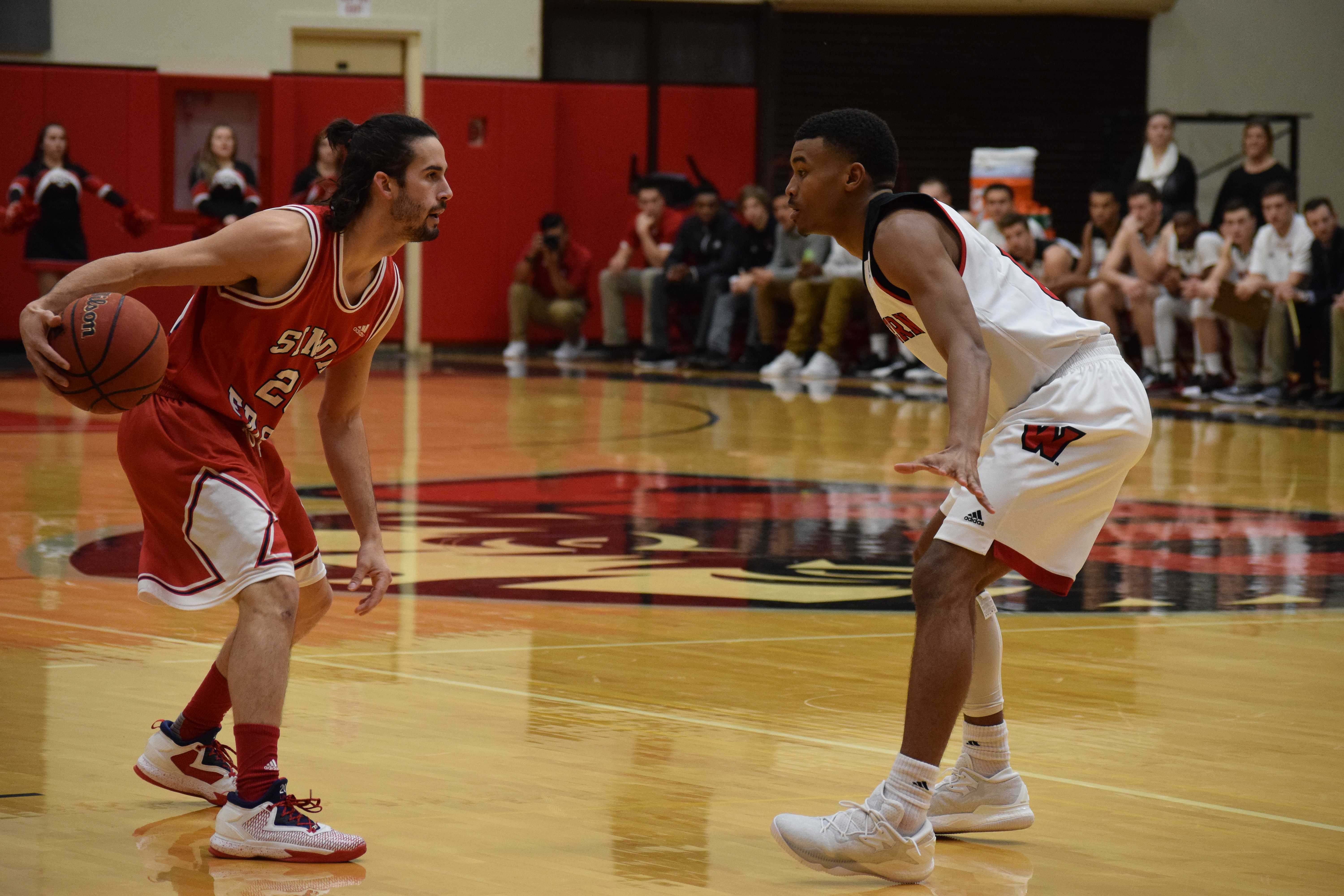 Men’s basketball fights hard through conference play