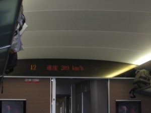Traveling from Beijing on a Bullet Train. We hit a top speed of 295 km/h before getting stuck for 5 hours due to heavy rain.