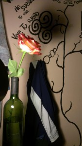Artsy rose shot next to the wall art in my room