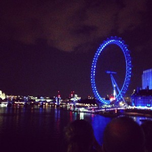 Night bus tour view of the London Eye 